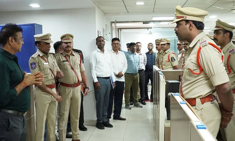 Hyderabad police officers and officials in a briefing room during cyber fraud investigation.