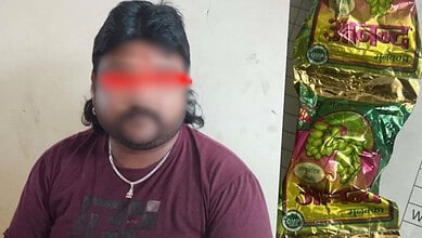 Man with blurred face and cannabis chocolates seized by Belagavi police.