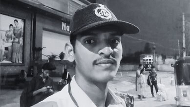 Young police officer in uniform at the scene of an incident in Hyderabad.