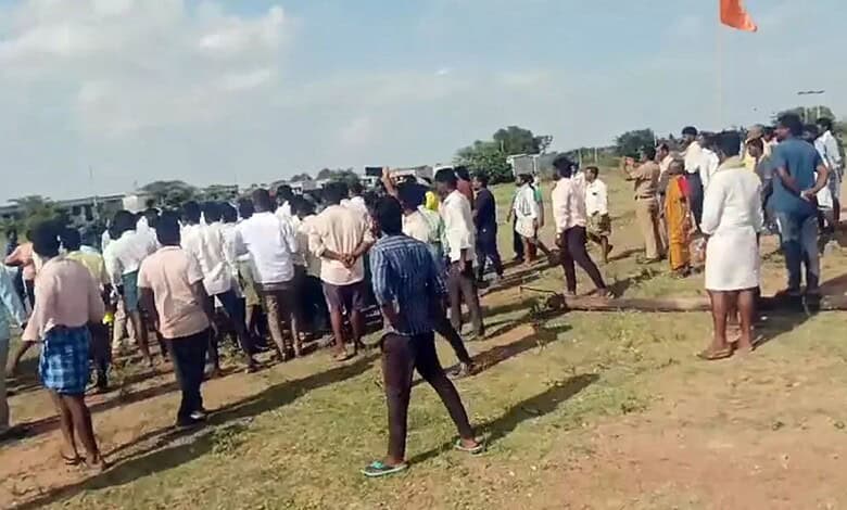 Large crowd gathered at the site of a clash between a church and temple in Karnataka.