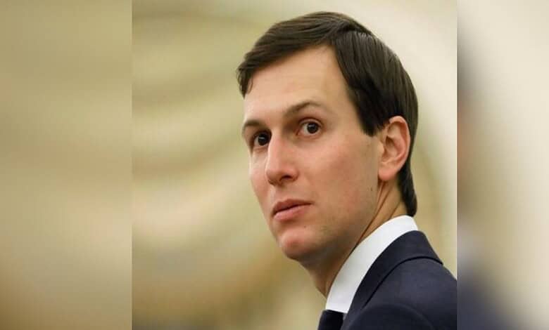 Jared Kushner in a formal suit looking to the side with a neutral background.
