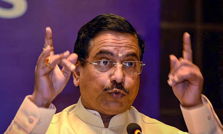 Union Minster Pralhad Joshi addresses a gathering