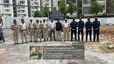 HYDRAA officials errect a notice board afte fencing a park in Chandanagar