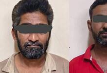 Two men with black bars over their eyes, facing camera, in a police custody setting.