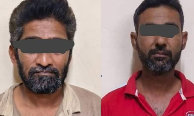 Two men with black bars over their eyes, facing camera, in a police custody setting.