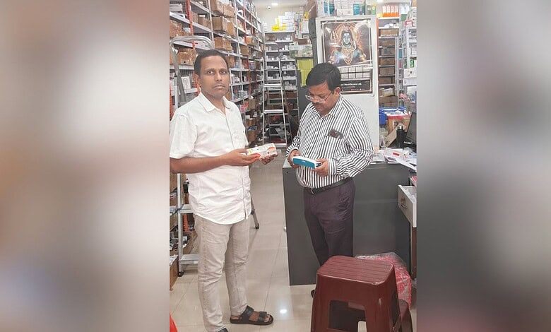 Two men in a pharmacy discussing weight loss drugs, shelves filled with medicines in the background.