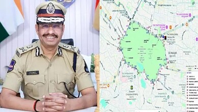 Police officer in uniform smiling with a map of KBR Park in the background.