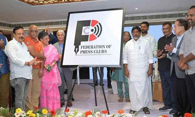 Group of people at the Federation of Press Clubs launch event in Hyderabad.
