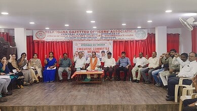 Group of officials and employees attending a meeting at Telangana Gazetted Officers' Association.