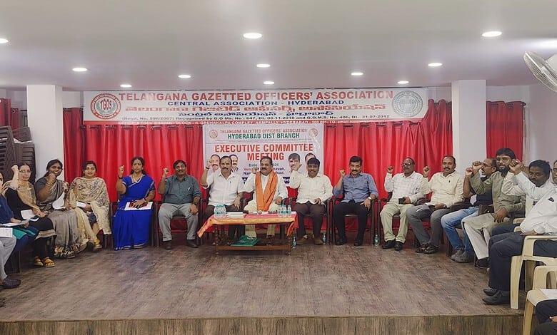 Group of officials and employees attending a meeting at Telangana Gazetted Officers' Association.