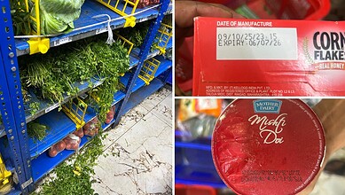 Fresh green herbs and vegetables on supermarket shelves in India.
