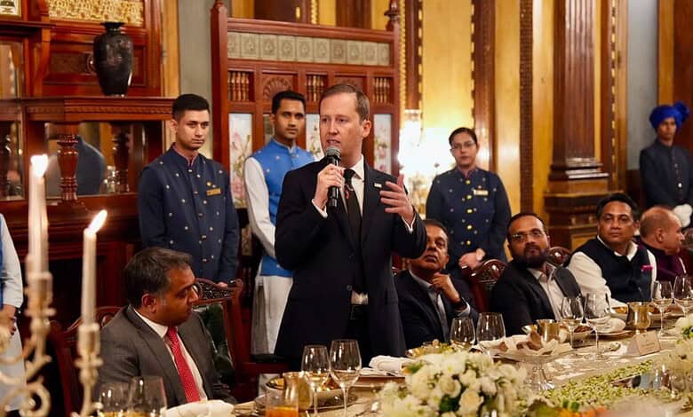 US envoy speaking at a formal dinner event at Taj Falaknuma, Hyderabad.