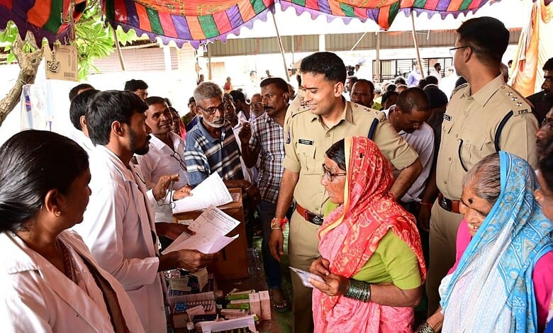 Adilabad SP Akhil Mahajan interacts with people during a programme