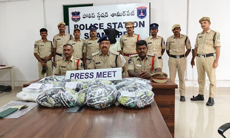 Shamipet police with Kumar and the seized ganja
