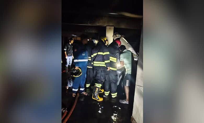 Fire officials rescue residents in Film Nagar after a fire accident