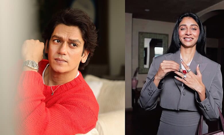 Vijay Varma and Dolly Singh smiling and posing for the camera at an indoor event.