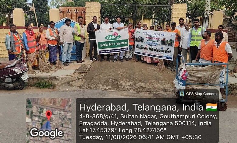 Group of Hyderabad officials and workers during sanitation and pothole repair work.