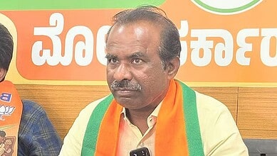 BJP MLC N Ravikumar at a press conference with a serious expression.