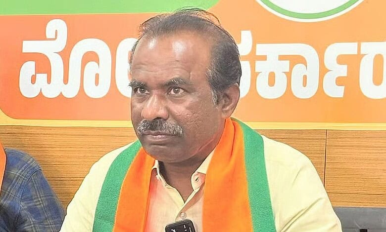 BJP MLC N Ravikumar at a press conference with a serious expression.