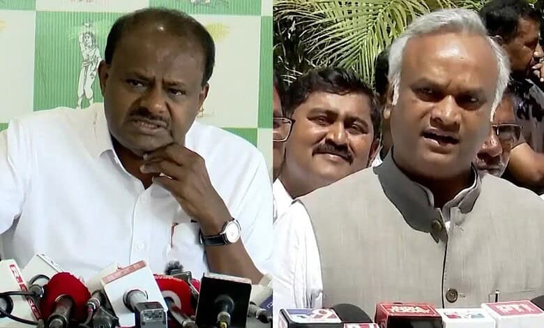 Kumaraswamy and Priyank Kharge at a press conference amid allegations of irregularities.