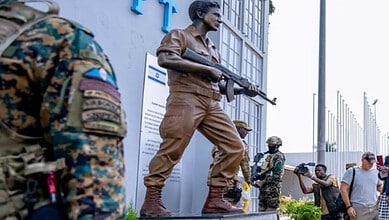 Statue of Netanyahu's brother unveiled by Uganda's military with soldiers and media present.