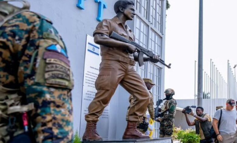 Statue of Netanyahu's brother unveiled by Uganda's military with soldiers and media present.