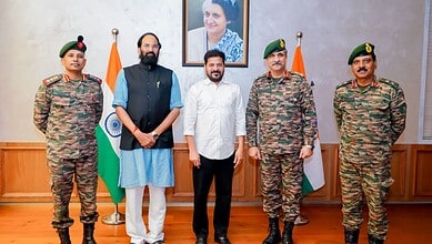 Telangana Chief Minister Revanth Reddy with Lieutenant General C Rajesh Pushkar
