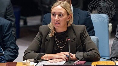 UN official speaking at a meeting about Gaza aid restrictions and humanitarian challenges.