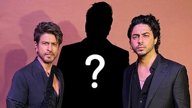 Two men in black suits with a silhouette and question mark between them.