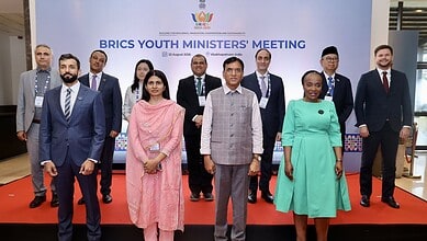 BRICS Youth Ministers' Meeting in Visakhapatnam with diverse delegates on stage.