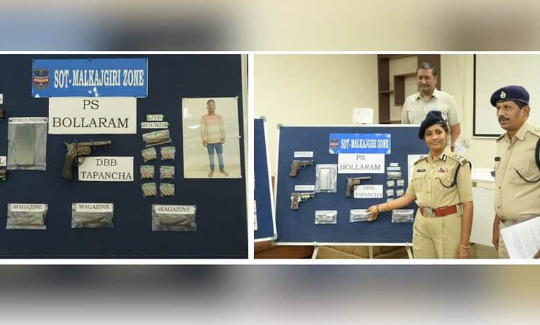 Police display seized firearms and ammunition in a police station.