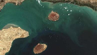 Satellite image of Larak Island in the Persian Gulf with surrounding waters and landmasses.