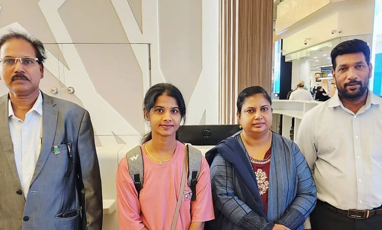 Indian nurse Maria Stella Martin with supporters after returning from Saudi Arabia.