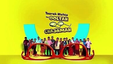 Group photo of Taarak Mehta Ka Ooltah Chashmah cast with large glasses prop.