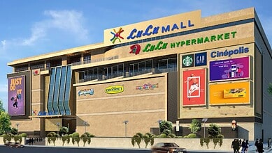 Lulu Mall in Hyderabad, featuring various retail outlets and digital billboards.