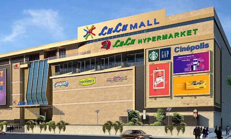 Lulu Mall in Hyderabad, featuring various retail outlets and digital billboards.