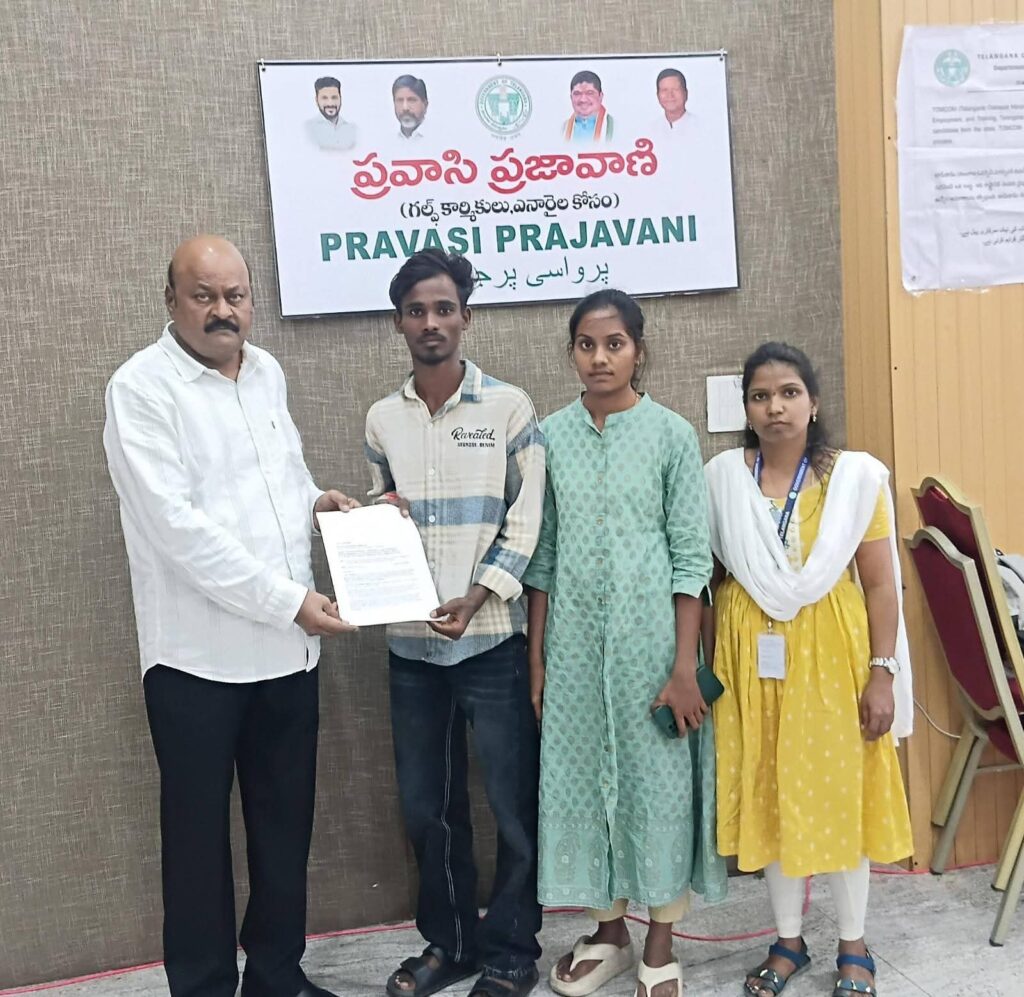Manda Bheem Reddy receives a petition from Gaddam Arun at the CM Pravasi Prajavani in Hyderabad.
