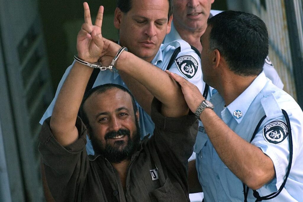 Marwan Barghouti returning to jail after a Tel Aviv court appearance in 2003.