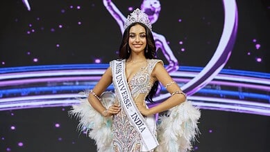 Kerala girl wearing crown and sash at Miss Universe India 2026 event.