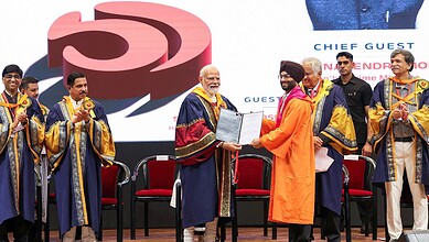 Prime Minister Modi at IIT Delhi convocation ceremony with graduates and officials.