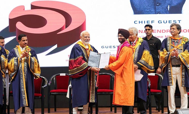 Prime Minister Modi at IIT Delhi convocation ceremony with graduates and officials.
