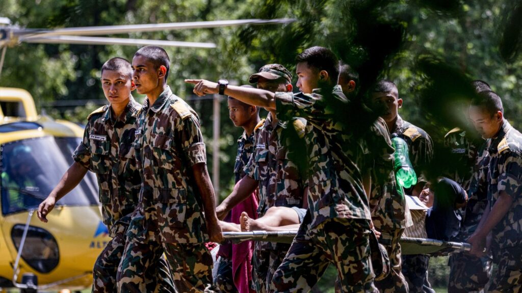 Nepal army personnel amid a rescue and search operation after flash floods, at the Army Training Centre in Nuwakot, Nepal, Thursday, Aug. 27, 2026. The death toll from the devastating flash floods surged to 359 on Thursday. (PTI Photo/Abhishek Maharjan)