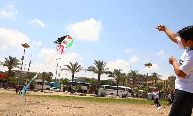 Palestinian child flying a kite in Gaza.