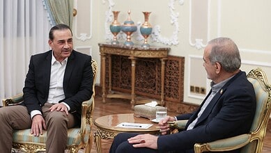 Pakistani and Iranian officials in a formal meeting to discuss regional issues and cooperation.