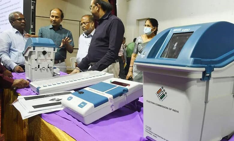 Electoral voting machines displayed at Telangana polling station for election process.