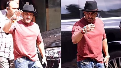 Salman Khan celebrating Rakhi, wearing a tilak and casual attire with a hat.