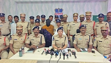 Police officers and officials during a press conference in Siddipet.
