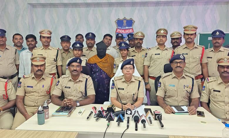 Police officers and officials during a press conference in Siddipet.