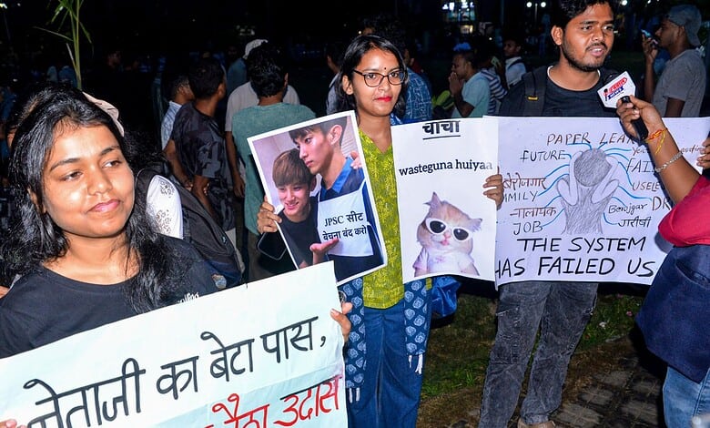 Protesters holding signs during hunger strike in Jharkhand, India.