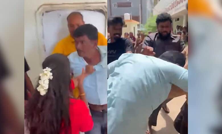 Teacher involved in misconduct incident with students in Telangana, captured in a crowd scene.